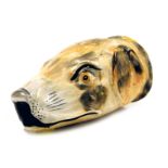 A 19thC Staffordshire pottery stirrup cup, modelled as a hound's head, 12cm high. (AF)
