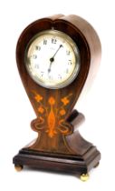 A late 19thC French art nouveau mahogany balloon cased mantel clock, circular dial bearing Arabic nu