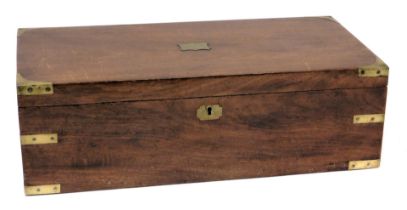 A Victorian mahogany and brass bound writing slope, the hinged lid opening to reveal a fitted interi