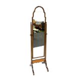 An early 20thC framed cheval mirror, 157.5cm high.