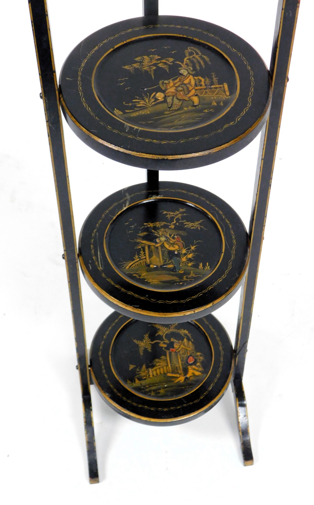 A late Victorian Japanese lacquer three tier folding cake stand, decorated with figures in a garden - Image 2 of 2