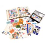 Philately. Great Britain and world stamps, QV-EII, in a Strand stamp album, together with a tin of l