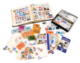 Philately. Great Britain and world stamps, QV-EII, in a Strand stamp album, together with a tin of l