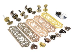 A group of Adam style door furniture, including finger plates, key escutcheons and door knobs. (qty)