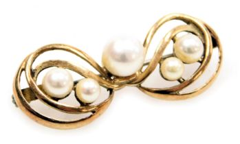 A pearl set brooch, with five pearls in a bow setting, yellow metal, 5.1g.