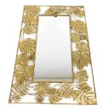 A late 20thC gilt metal rectangular wall mirror, inset bevelled glass, within a frame of scrolling l