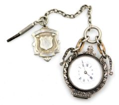 A late 19thC lady's pendant watch, with a circular enamel dial bearing Roman and Arabic numerals, gl