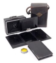 A vintage Ihagee folding camera, with plates, cased.