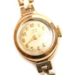 A Tudor Royal lady's 9ct gold cased wristwatch, circular champagne dial bearing Arabic numerals, on