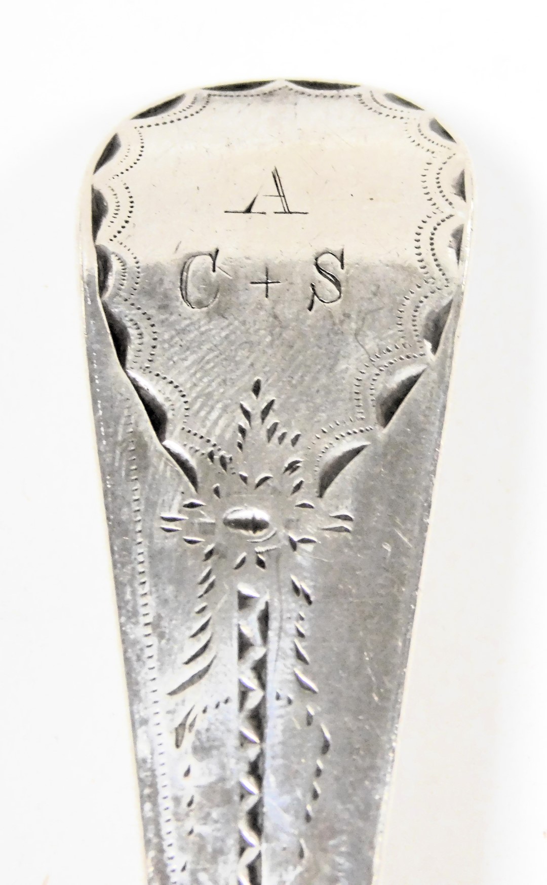 A pair of George III silver tablespoons, with bright cut engraving, terminal with monogram reserve, - Image 2 of 3