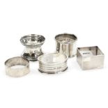 Five silver napkin rings, variously decorated, 3.98oz.