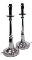 A pair of Roville black nickel table lamps, of candlestick form, raised on a circular base, 51.5cm h
