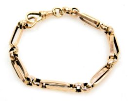 A 9ct rose gold trombone link bracelet, on a lobster claw clasp, 14.1g.