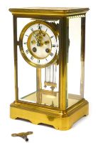 A late 19thC French brass cased regulator clock, by Hy Marc of Paris, circular brass dial with ename