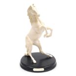 A Beswick matt white pottery figure of Spirit of the Wild, raised on a named circular base, 31cm hig