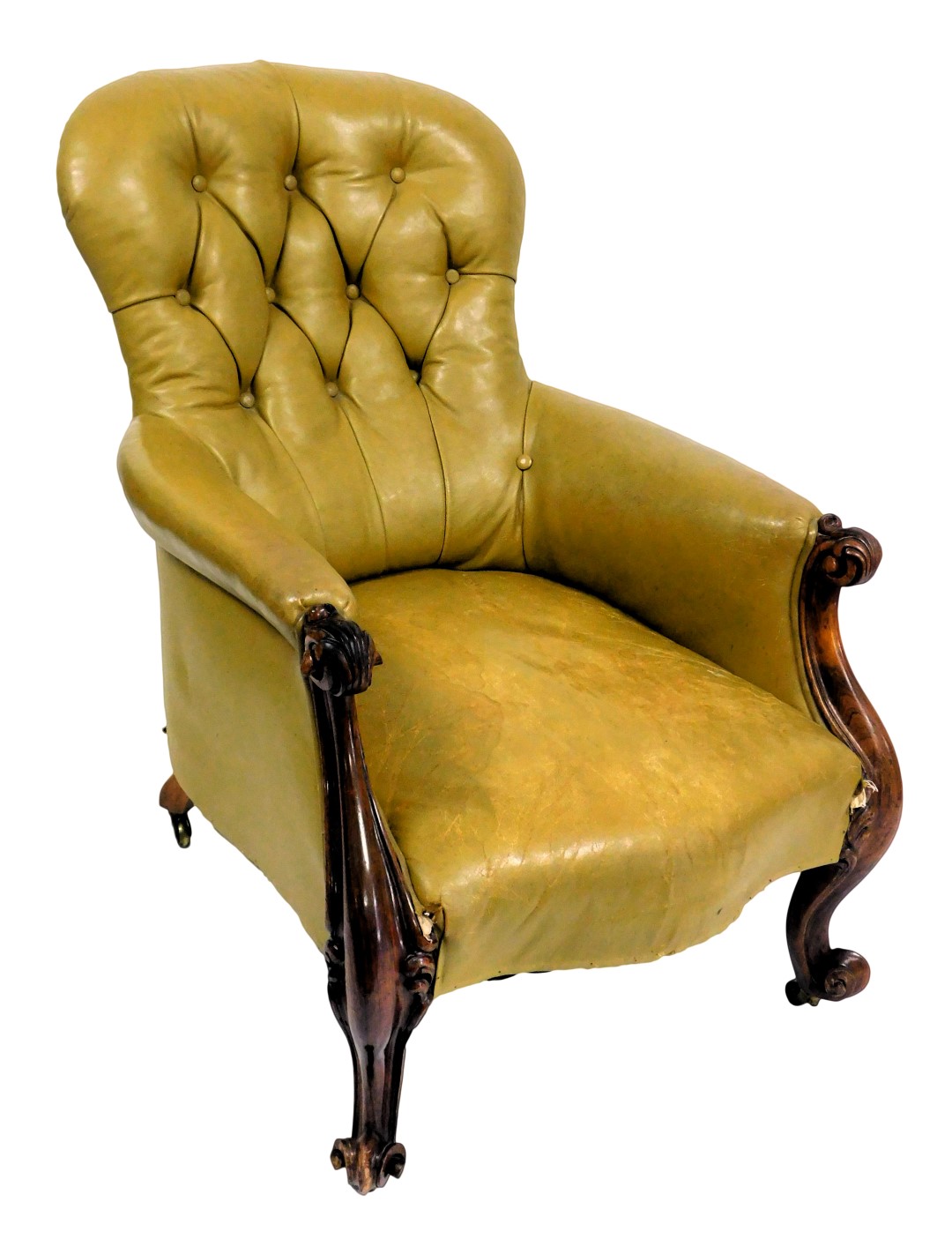 A Victorian rosewood, button spoon back nursing chair, upholstered in tan leather fabric, raised on