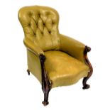 A Victorian rosewood, button spoon back nursing chair, upholstered in tan leather fabric, raised on