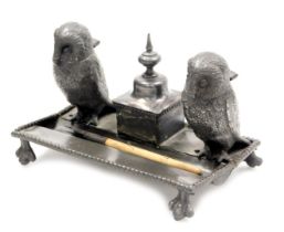 A late 19thC novelty desk stand, with twin owl inkwells and pen recess, on a rectangular base, and f