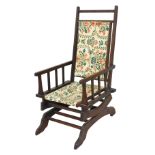 A late 19thC American beech wood rocking chair, 53.5cm wide.