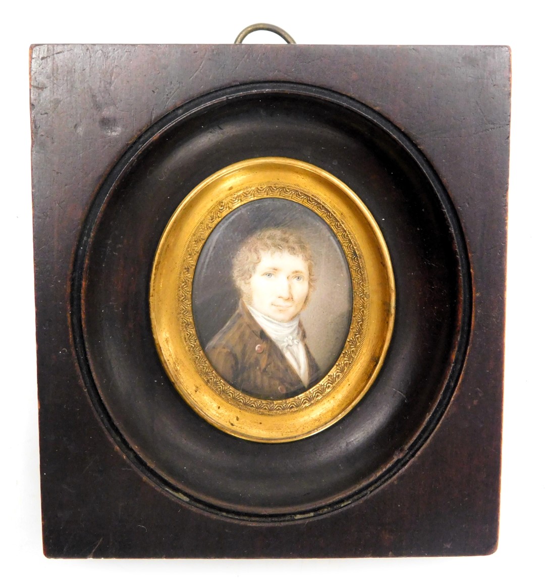 A late 18thC miniature portrait, head and shoulders study of a gentleman, framed, 3.5cm x 2.5cm.