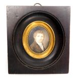 A late 18thC miniature portrait, head and shoulders study of a gentleman, framed, 3.5cm x 2.5cm.