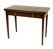 A George III oak fold over tea table, raised on tapering square legs, 73cm high, 91cm wide, 45cm dee