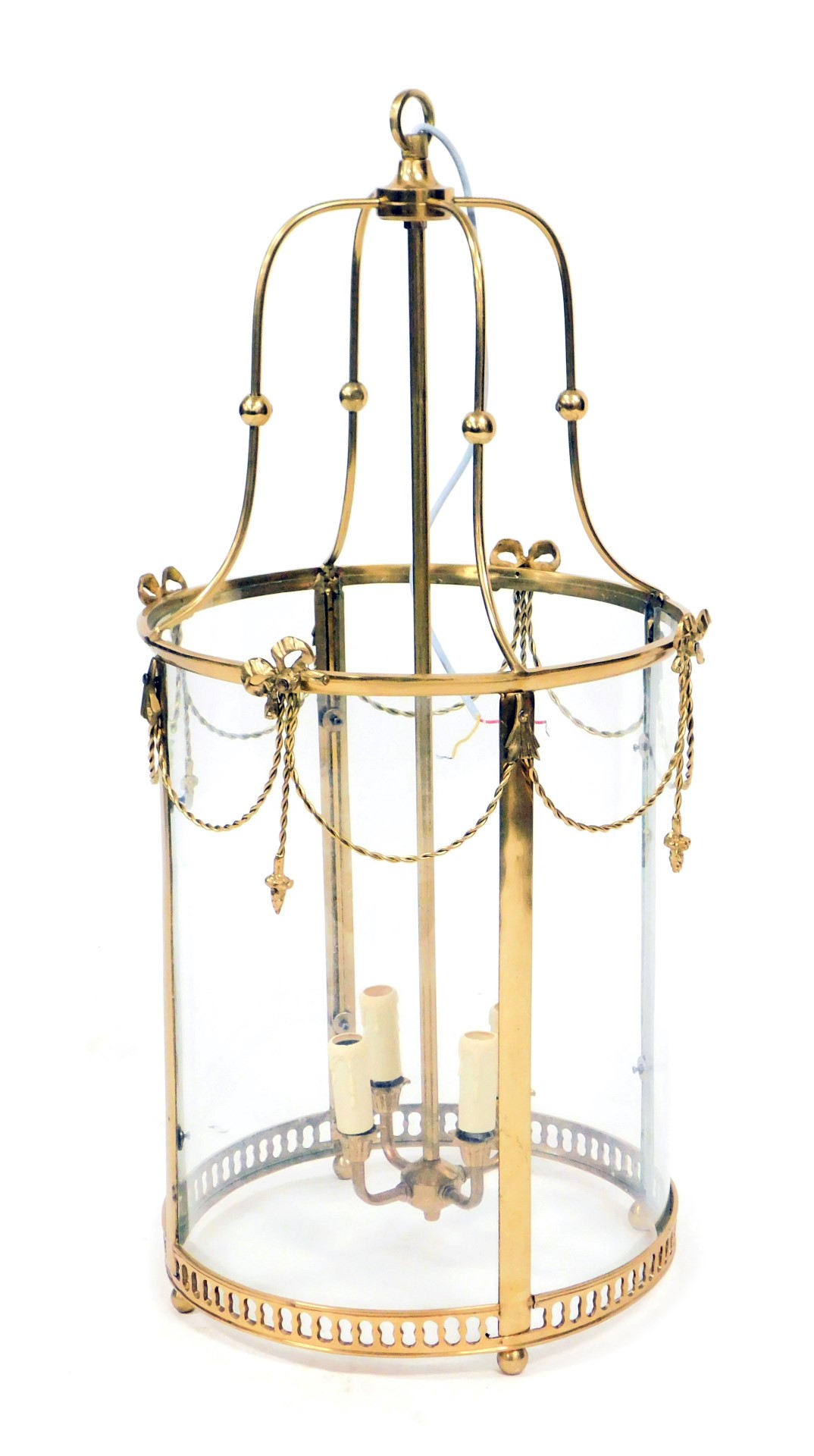 A Victorian style brass hall lantern, with four internal branches, and four glass panels, 82cm high.