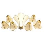 A brass and white opalescent triple petalled wall light, 28cm high, together with six similar lampsh