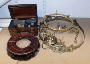 A Victorian walnut and inlaid tea caddy, the hinged lid enclosing two compartments filled with draug