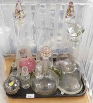 Glassware, to include a decanter with millefiori stopper, two other decanters with stoppers, glass j