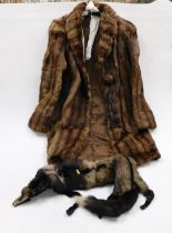 A full length lady's fur coat, and a fox stole.