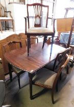 A 20thC mahogany extending dining table, 74cm high, the top 87cm x 110cm, together with five mahogan