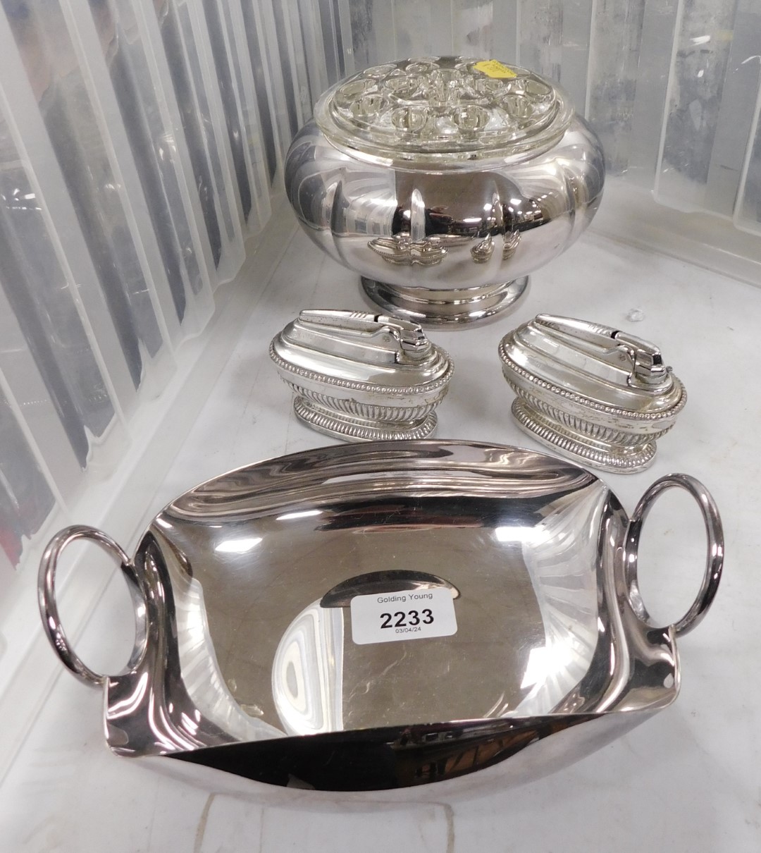 Silver plated items, to include two Ronson table lighters, a silver plated twin handled tray, and a