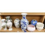 A quantity of Oriental ceramic vases, including a large blue and white vase, various other vases, mo