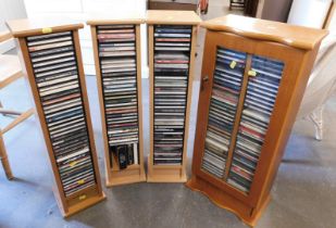 Four CD towers, containing various CDs, predominantly classical. (4)