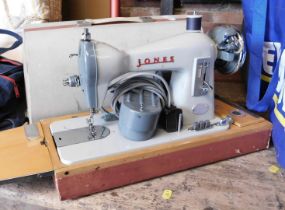 A cased Jones sewing machine.