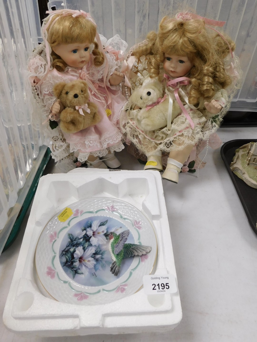 Two Bradford Exchange hummingbird plates, two dolls, one doll approx 32cm high.