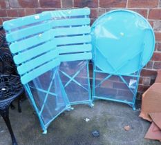 A blue painted metal garden set, comprising folding table and two chairs.