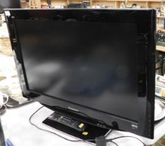 A Panasonic Viera flat screen TV with remote, model number TX-32LZD81.