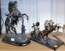 A spelter figure of a Marli horse, on a plinth base, and a bronzed metal figure of chariot with two