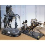 A spelter figure of a Marli horse, on a plinth base, and a bronzed metal figure of chariot with two