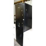 A Hoover fridge freezer, in black.