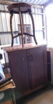 A yew two door side cabinet, 102cm high, 82cm wide, 54cm deep, together with a two tier occasional t