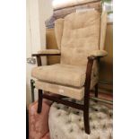 An oak framed wingback type armchair.