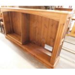 A pine open bookcase, 103cm high, 103cm wide, 31cm deep.