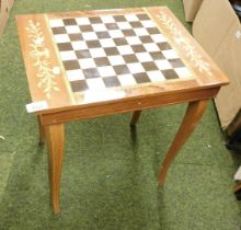 A games table, the hinged lid enclosing a group of souvenir spoons.