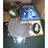 Two framed pictures, oval shaped mirror, and a still life scene.