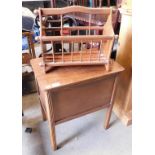 A mahogany sewing box, together with a mahogany magazine rack.