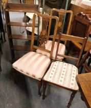 A group of furniture, including an oak bookcase, and a pair of Edwardian mahogany and inlaid salon t