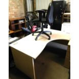 A modern lightwood office desk, 73cm high, the top 162cm x 104cm, together with an office chair.